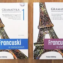 Dwie książki "Francuski w tłumaczeniach" z Wieżą Eiffla, idealne do nauki francuskiego.