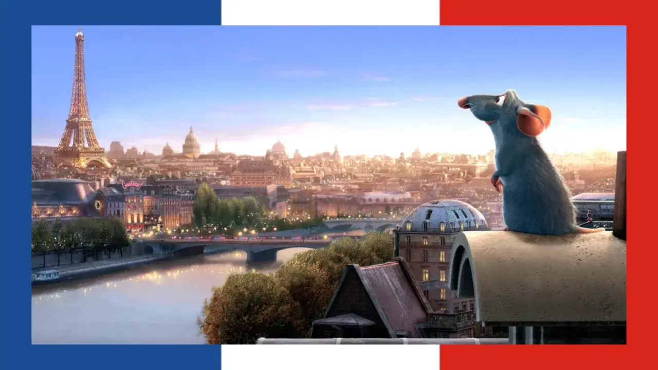 Szczur Remy z filmu "Ratatuj" podziwia panoramę Paryża, gdzie "voilà" po francusku oznacza "oto".